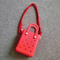 Red EVA tote bag with perforated hole design and adjustable red textile shoulder strap - Red