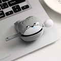 Creative gray cartoon animal silicone cable protector used on a keyboard workspace - Sacabambaspis Wooden Fish - Smirk Single