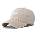 Detail of white butterfly embroidery on a beige washed cotton baseball cap texture - Butterfly Beige