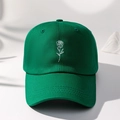 Detailed close-up of white rose embroidery on dark green cotton twill baseball cap - Dark Green