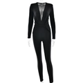 Slim fit black long sleeve bodysuit with deep V-neck and twist detail on plain background - S / Black