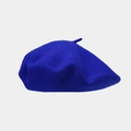 Close-up of a blue wool beret showing high-quality fabric texture and soft felt finish - Royal Blue
