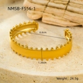 Detailed macro view of gold-plated stainless steel cuff bracelet with rivet texture details - Open Rivet (NMSB-F556-1)