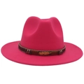 Detail of fuchsia wool fedora with brown beaded band and golden feather metal accent - Rose Red