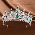 Detail of silver bridal crown featuring green teardrop gemstones on brown silk background - Silver Green