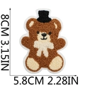 Brown teddy bear towel embroidery patch with size dimensions 8cm by 5.8cm in a macro view - Style 11 (Gentleman Bear with Hat)