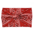 Detail of red paisley wide knotted headband with classic bohemian pattern on white surface - Red Paisley