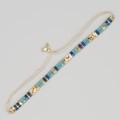Détail du bracelet bohème fait main en perles tila avec cordon tissé ajustable - Bleu Bleu-Lac Blanc Or Tissé
