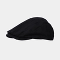 Detailed view of the vintage distressed black cotton flat cap with handmade frayed hole texture - One Size / Black