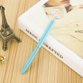 Light blue ballpoint pen with heart crystal top and silver metallic accents - Light Blue