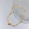 Elegant gold plated heart tennis bracelet with cubic zirconia and mirror reflection - Gold Heart Zirconia Bracelet (G3248)