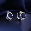 Elegant silver earrings with oval blue gemstone and white zircon halo on blue silk - Blue Diamond Sunflower Earrings Led-138