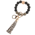 Detail of leopard print beads and silicone wristlet keychain with leather tassel - Leopard Print
