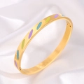 Golden titanium steel bangle featuring colorful purple and green enamel heart oval patterns - Gold Oval Enamel