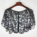 Kurzes schwarzes Mesh-Cape mit silbernen Pailletten-Fächermustern am Kleiderbügel - Schwarz Silber