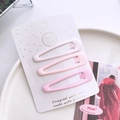 Dettaglio di tre fermagli per capelli rosa sfumati su un cartoncino bianco da esposizione - Set di 3 / Goccia d'Acqua Rosa