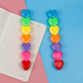 Colorful heart-shaped stackable highlighter pen with 7 sections on a notebook background - 6 Colors/7 Sections Stackable / Colorful