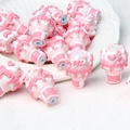 Macro detail of hand-painted ice cream acrylic beads in pink and white for DIY crafts - 1 Piece / Flat + Hi + Pink Heart