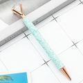 Mint green sequined ballpoint pen with rose gold accents and a large crystal diamond top - Teal