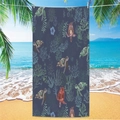 Detail of microfiber beach towel featuring turtle and coral prints on blue background - Sea Turtle Beach Towel 2