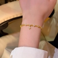 Elegant gold clover bracelet with white zircons and a small dangling pendant charm - S689 Gold - Zirconia Star Bracelet