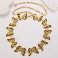 Close-up of bohemian butterfly waist chain with turquoise stones in vintage gold finish - Antique Gold Turquoise Butterfly (11444)