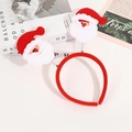 Diadema de Navidad con Papá Noel rojos sobre un fondo festivo y acogedor - Papá Noel / Rojo
