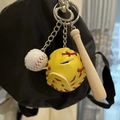 Three-piece baseball keychain with yellow glove, white ball, and wood bat on a bag - 2CM Long Bat White Ball Yellow Glove Red Strap