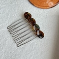 Tortoiseshell hair comb detail, resin twisted design with metal tines for chic hairstyles. - 5.50cm / Marbled Glazed