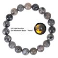 Detail of natural yooperlite bead bracelet showing vibrant UV light flame reaction - 10mm-Flame Stone Bracelet
