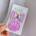 Set de horquillas brillantes moradas y rosas para niñas con lazo y diseño de concha - Lazo/Concha / Morado
