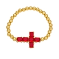 Golden beaded cross bracelet featuring five rectangular red cubic zirconia stones - Red