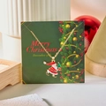 Gold Christmas necklace with Santa Claus pendant and rhinestones on festive gift card - Santa Claus