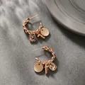Rose gold twisted C-shape earrings with hanging cross and hammered metal disc pendants - Triple Pendant Woven Drop Earrings (No. 8) / Rose Gold