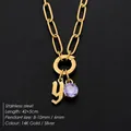 Titanium steel necklace with lowercase 'y' pendant and purple sparkling crystal - Lowercase y