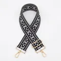 Close-up of geometric diamond pattern strap with golden metal lobster clasps - Gold Buckle / Dark Blue