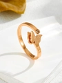 Macro shot of rose gold butterfly ring with matte finish and sparkling rhinestone inlay - D001 Butterfly Ring Rose Gold
