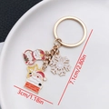 Christmas snowman and Santa enamel keychain with measurements 7.1cm height and 3cm width - ER821-Enamel Christmas Snowflake Snowman Santa Keychain