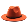 Detail of orange wool fedora hat featuring a black braided leather decorative band - Caramel color