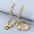 Punk style gold skull jewelry set featuring woven snake chain necklace and bracelet - Bracelet 19cm + Necklace 45cm / Gold