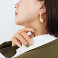 Golden liquid metal style irregular earrings and ring set worn on model - Gold Color Irregular Wave Earrings