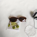 Retro oval small frame sunglasses in translucent amber brown with dark brown lenses - Transparent Dark Tea