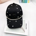 Detail of black baseball cap featuring floral texture, rhinestone chain, and a heart ornament - Adult Size (56-60cm) / Black