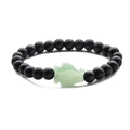 Close-up of matte black agate beads and a green aventurine fish charm on a beaded bracelet - Green Aventurine Matte Stone