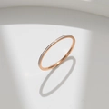 Minimalist rose gold titanium ring featuring a white enamel inlay and thin band - US 6 / White