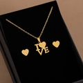 Conjunto de collar LOVE y pendientes de corazón en acero dorado con caja de regalo negra - X309