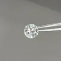Titanium steel screw stud earring with sparkling round-cut colorful cubic zirconia diamond - 6mm Light Powder Blue (Single Piece)