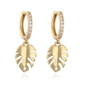 Detail of gold hoop earrings with zircon stones and monstera leaf pendants - Gold Monstera Leaf Hoop Earrings