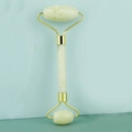 Detailed view of dual-head jade facial roller with green stone and gold metal frame - Double Head Jade Roller Lemon Jade