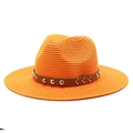 Close-up of orange straw sun hat featuring a brown leather band with silver metal studs - M (56-58cm) / Orange